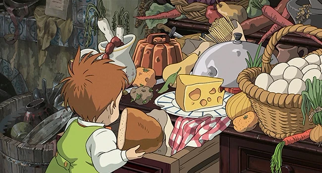 12 secretos de el castillo ambulante que solo los fans notaron - comida en el castillo ambulante animacion ghibli markl mess Detalle de la icónica escena de desayuno con huevos y beicon preparada por calcifer.